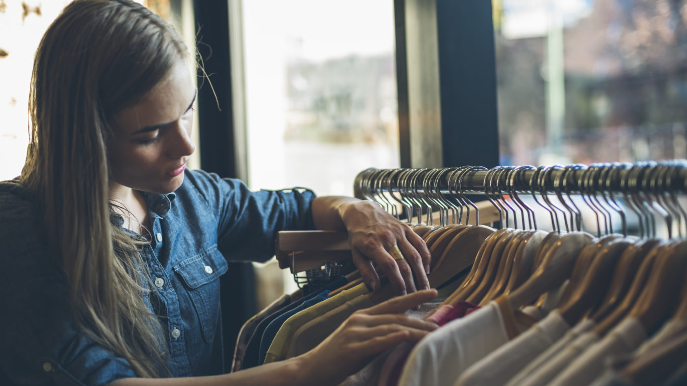 Girl shopping at apparel store featured image