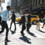 busy new york city street with cars driving featured image