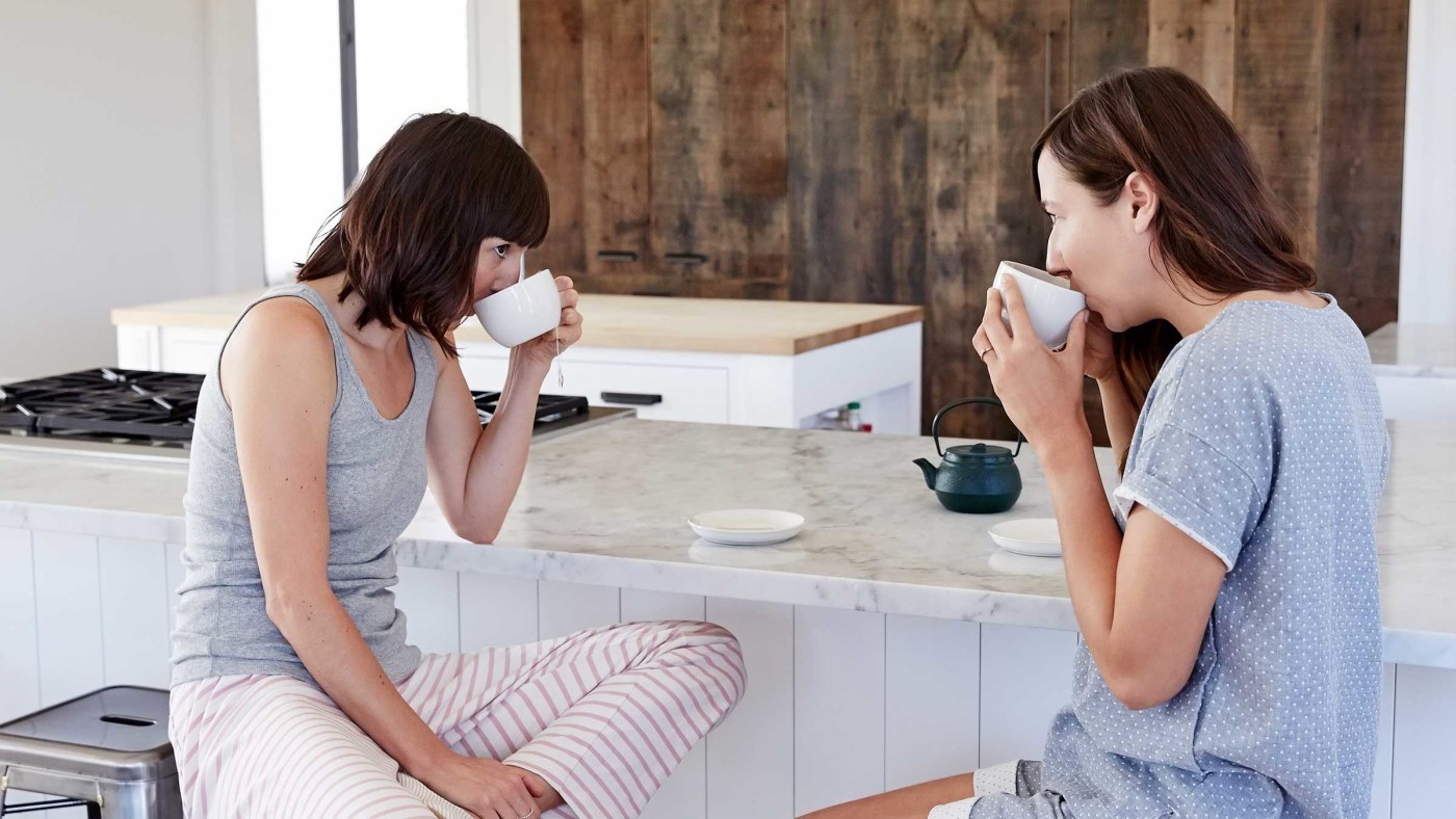 two women drinking tea featured image
