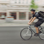 bicycle messenger on his way to shop.org featured image