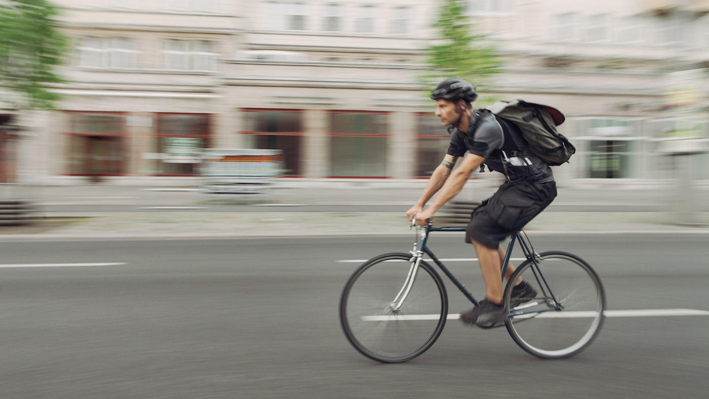 bicycle messenger on his way to shop.org featured image